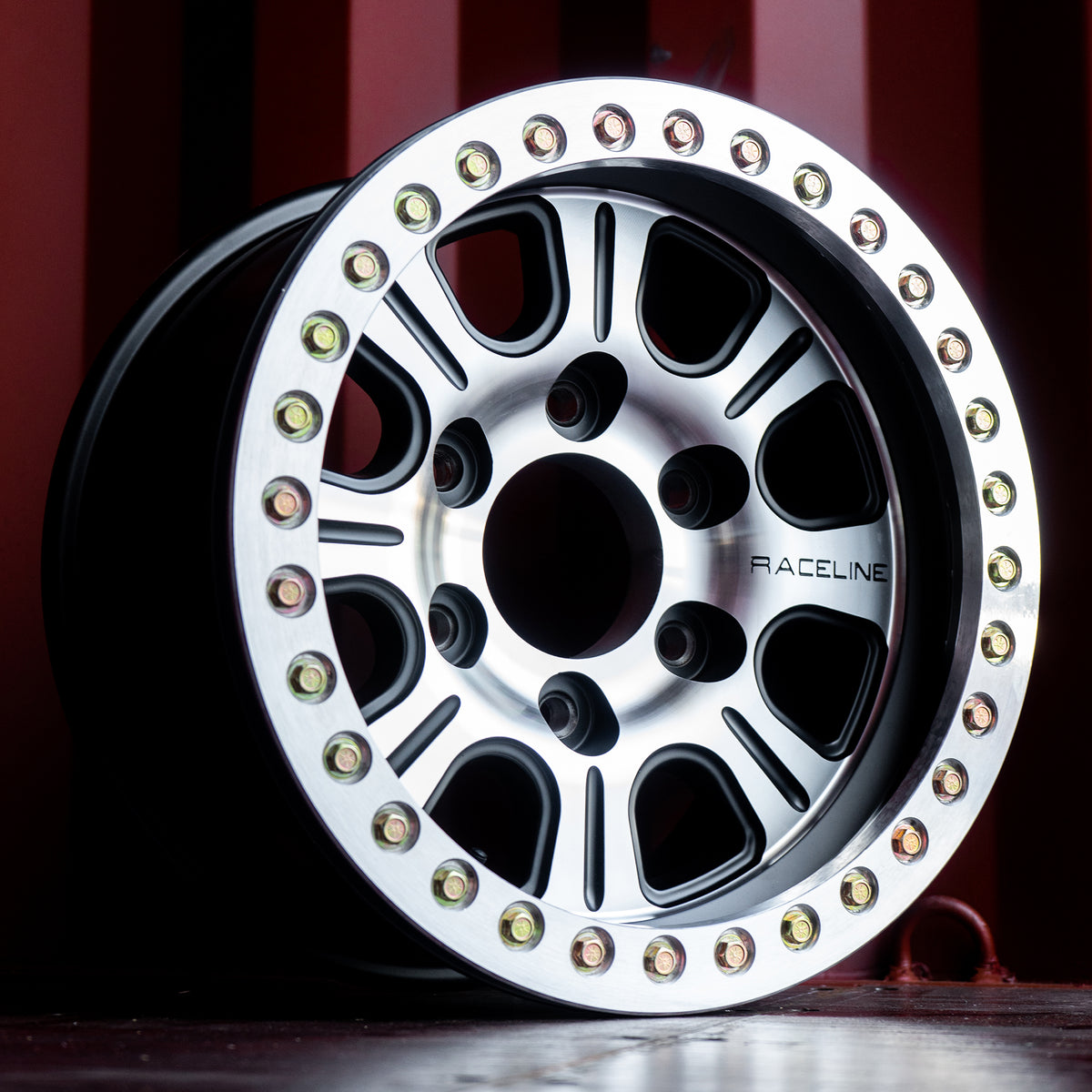 Raceline RT232 Monster 17x8.5in 6x135 BP -25mm Offset 87.1mm Bore - Black & Machined Beadlock Wheel