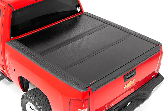 Rough Country Low Profile Hard Tri-Fold Tonneau Cover 07-13 1500 5.5 Foot Bed w/Rail Caps